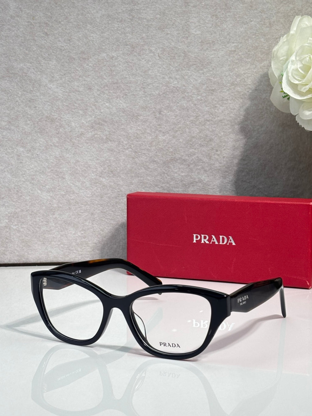Black Prada eyeglasses with rectangular frames and clear lenses