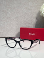 Dark Prada eyeglasses with rectangular frames and clear lenses