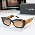 Tortoise sunglasses with beige fabric temples and gold logo detail