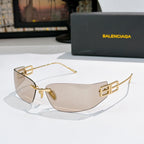 Shield sunglasses with gold frames and light brown tinted lenses, front angle