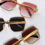 Miu Miu eyeglasses set with gold frames and pink, black, and brown lenses.