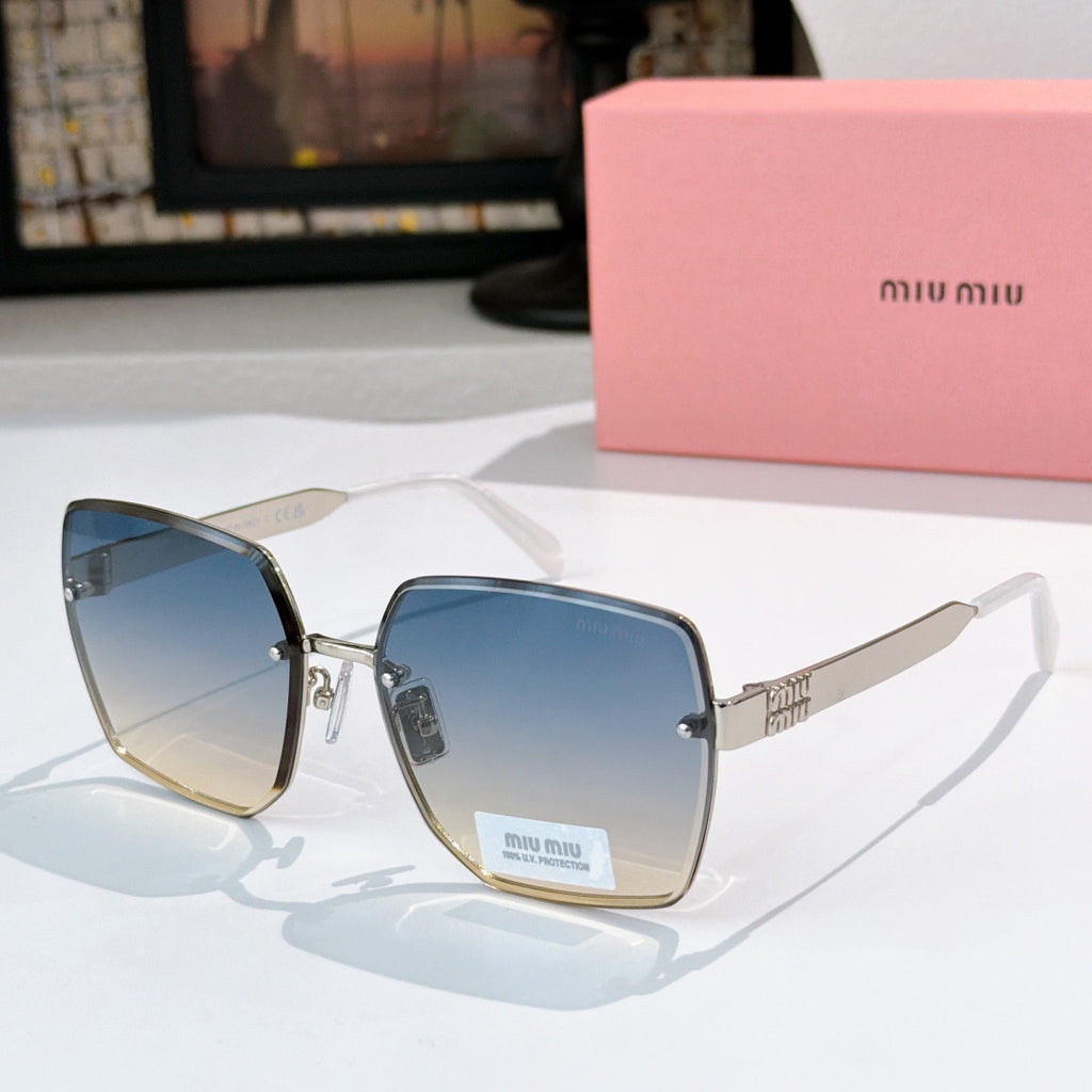 Miu Miu eyeglasses with gold-tone frames and blue-gray lenses, black temples.