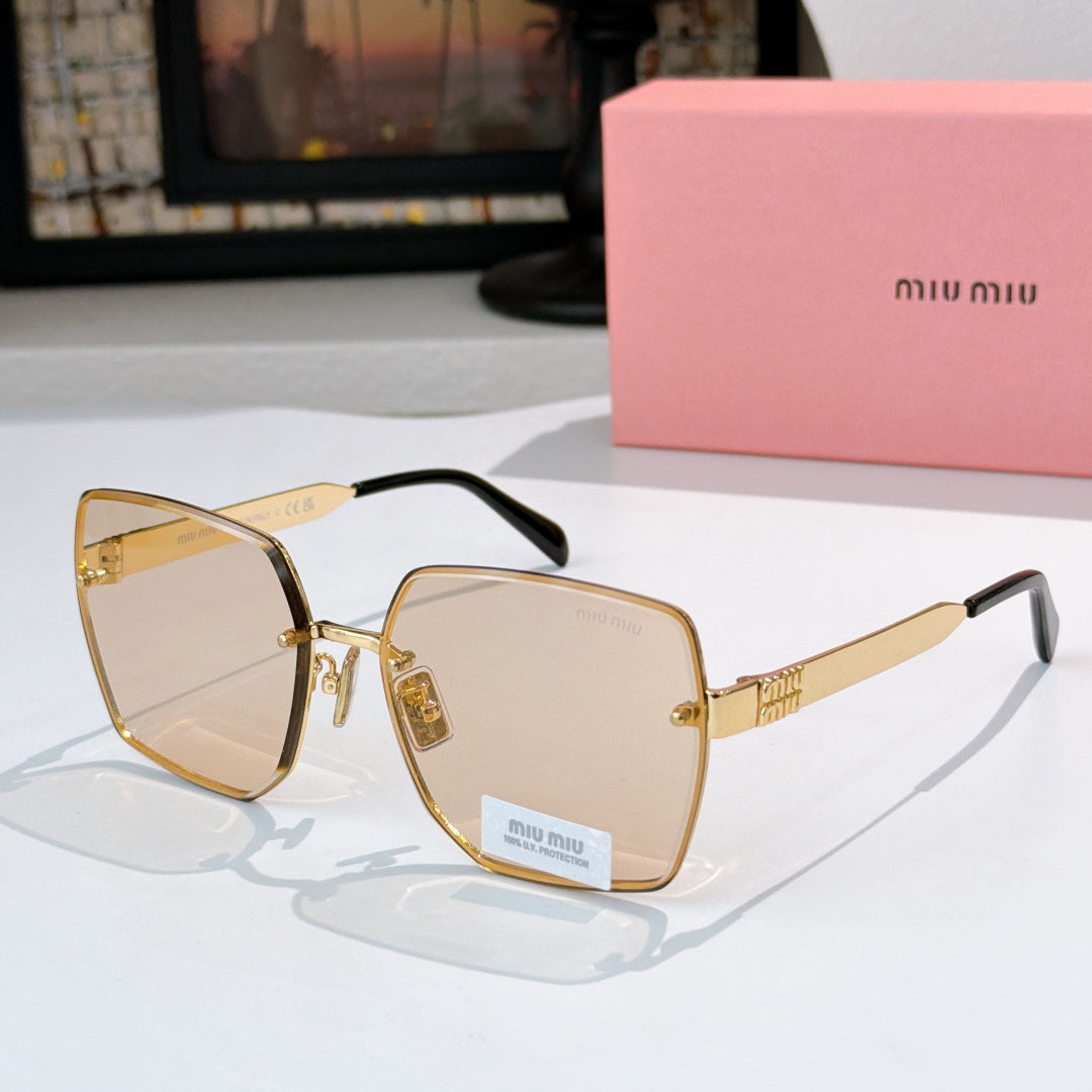 Miu Miu eyeglasses with gold-tone frames and light tan lenses, black temples.