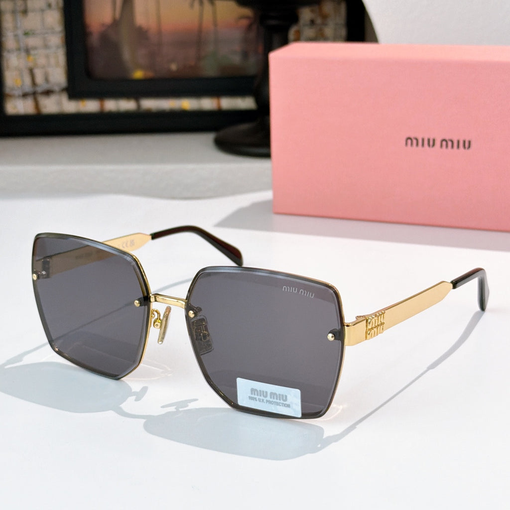 Miu Miu eyeglasses with gold-tone frames and dark gray lenses, black temples.