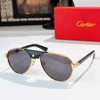 Gold-tone cat-eye sunglasses with gray-blue gradient lenses and dark frames