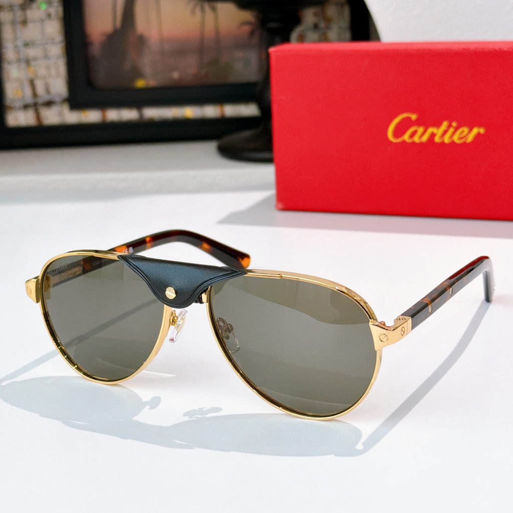 Gold-tone cat-eye sunglasses with light gray gradient lenses and tortoiseshell arms