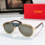Gold-tone cat-eye sunglasses with light gray gradient lenses and tortoiseshell arms
