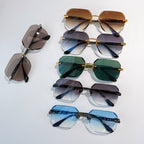 Assorted hexagon sunglasses with tinted lenses and gold-tone details