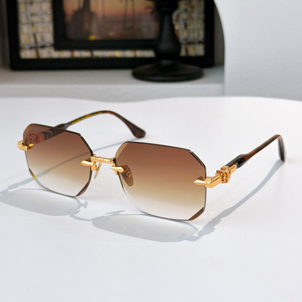 Hexagon sunglasses with gold metal frame and warm brown tinted lenses