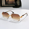 Hexagon sunglasses with gold metal frame and warm brown tinted lenses