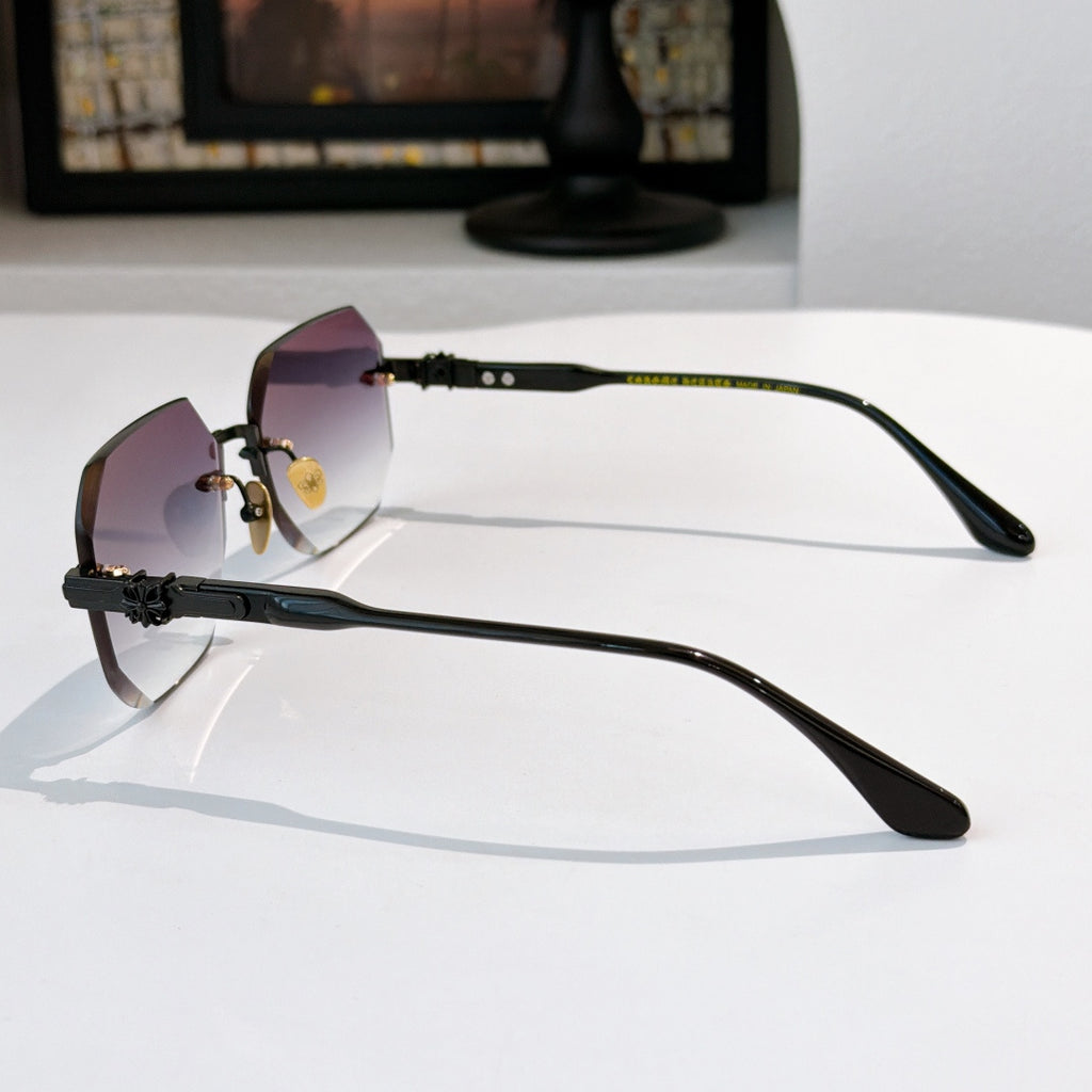 Side-view hexagon sunglasses with black frame and rose tinted lenses