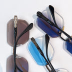 Sunglasses close-up with black frames and blue tinted lenses