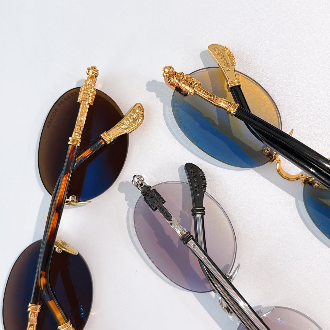 Assorted round chrome glasses with tinted lenses and metal frames, mixed colors