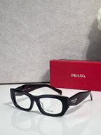 Prada eyeglasses with black rectangular frame and clear lenses
