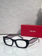 Prada eyeglasses with black frame and clear lenses