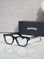 Chrome glasses with dark frames and clear lenses, gold temple accents