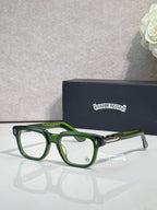 Chrome glasses with green frames and clear lenses, gold hinge detail