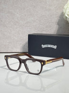Chrome glasses with brown frames and clear lenses, gold temple accents