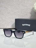 Black sunglasses with dark lenses and clear-accent temples