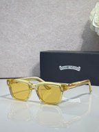 Yellow sunglasses with amber lenses and clear temple tips