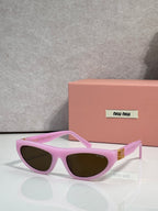 Light purple cat-eye sunglasses with dark lenses and gold logo detail at temples.