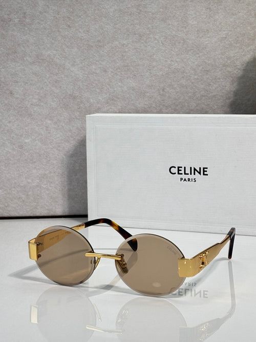 Celine sunglasses with round brown lenses and tortoise-pattern frame, gold-tone accents