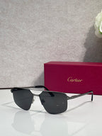 Sunglasses with silver metal frame and dark gray mirrored lenses, cat-eye shape