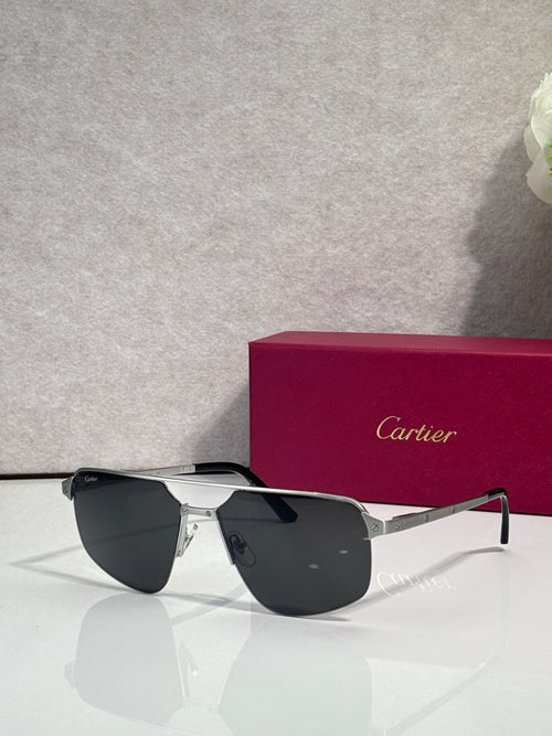 Sunglasses with silver metal frame and dark blue mirrored lenses, cat-eye shape