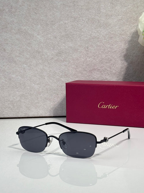 Cartier sunglasses with dark blue tinted lenses and black-and-silver metal frames