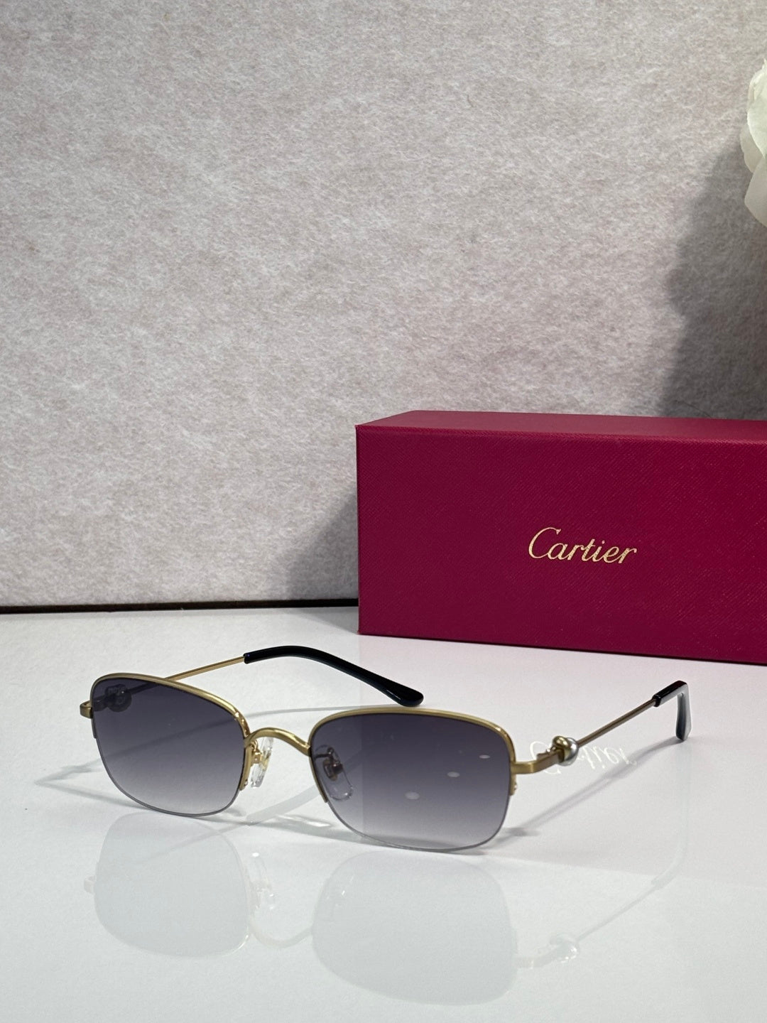 Cartier sunglasses with gradient lenses and gold-tone metal frames