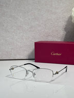 Cartier glasses with clear lenses, silver frame and black top bar