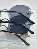 Cartier round sunglasses closeup showing dark lenses and silver-tone arms