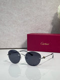 Cartier round sunglasses with dark gray lenses and silver-tone metal frames