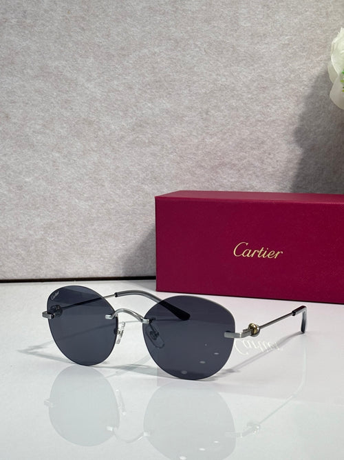 Cartier round sunglasses with dark gray lenses and silver-tone metal frames