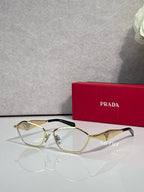 Prada optical glasses, gold metal frame, clear lenses, front view