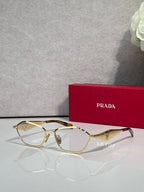 Prada optical glasses, gold metal frame with dark temple tips, side angle