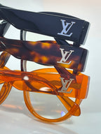 Eyeglasses with LV monogram on navy and tortoise temples, clear lenses