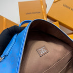 Blue monogram backpack interior with beige lining and rectangular brand patch