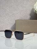 Bvlgari sunglasses with dark blue tinted lenses and gold-tone square frames