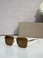 Bvlgari sunglasses with brown tinted lenses and gold-tone square frames