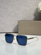 Bvlgari sunglasses with dark blue lenses and gold-tone square frames