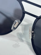 Bvlgari sunglasses close-up of dark blue frame and lens
