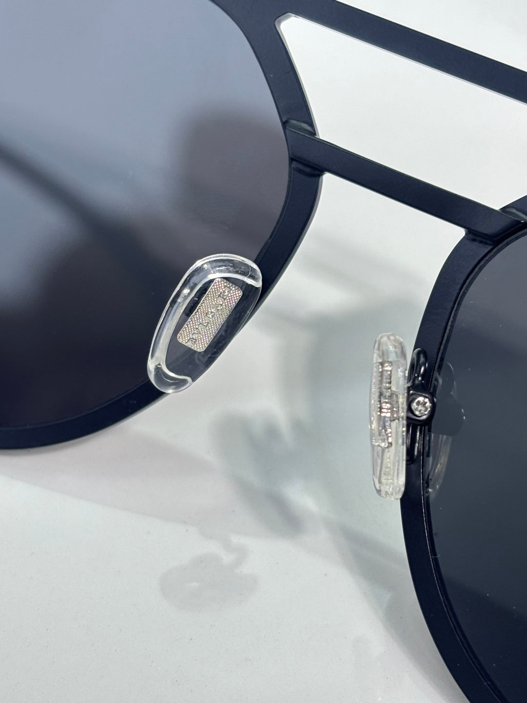 Bvlgari sunglasses close-up of dark blue frame and lens
