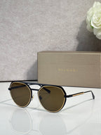 Bvlgari round sunglasses with dark brown lenses and gold metal frame