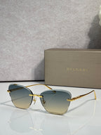 Bvlgari sunglasses, gold frame, light gold gradient lenses with slim metal temples