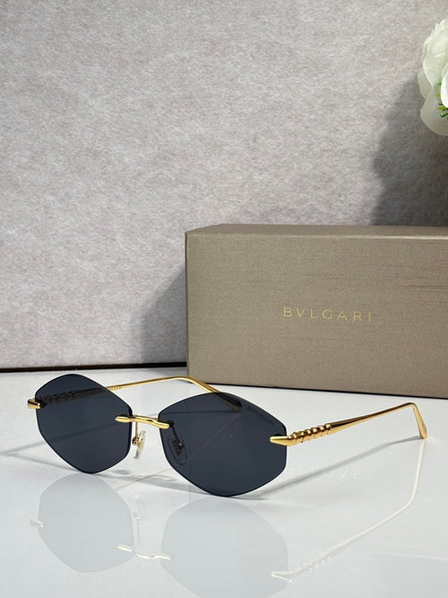 Bvlgari sunglasses with gold-tone frame and dark blue lenses