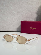 Rose gold-tone round sunglasses with beige-tint lenses and thin metal arms