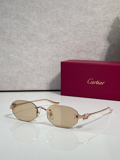 Rose gold-tone round sunglasses with beige-tint lenses and thin metal arms