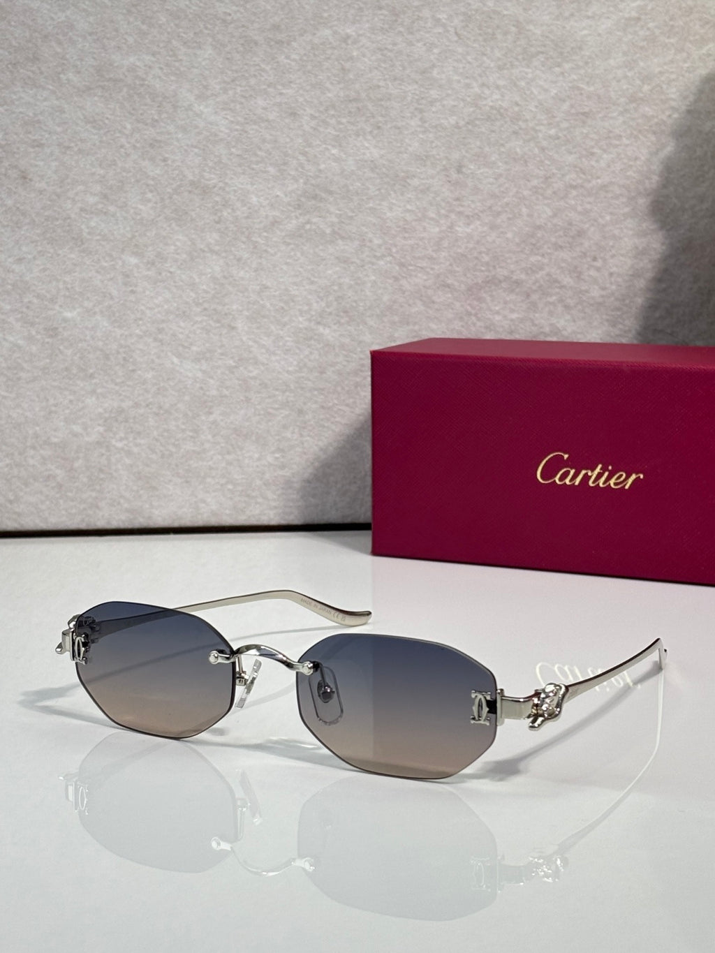 Dark-tint round sunglasses with mixed metal frame and gold-tone temple tips