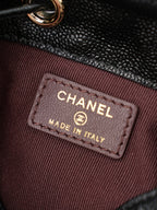 Chanel interior label reading CHANEL and MADE IN ITALY on burgundy lining